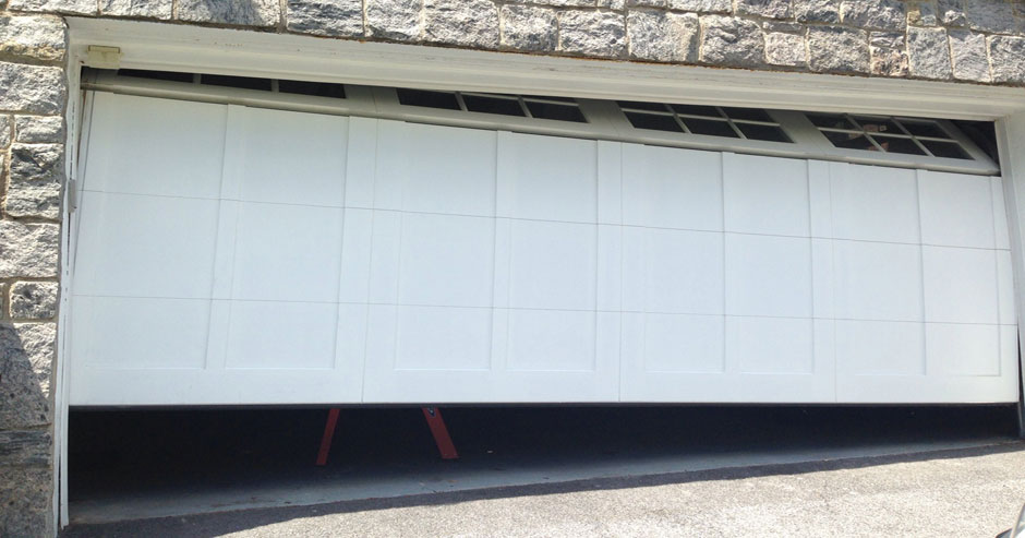 Broken garage door repairs Monroe County
